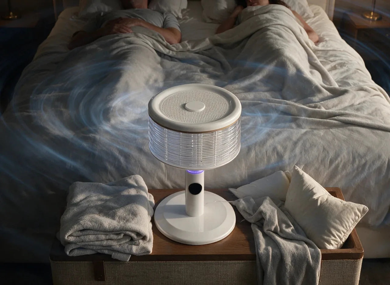 Couple asleep with Spin360 on the nightstand